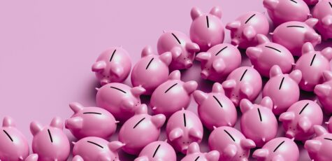 A large collection of pink piggy banks